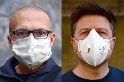 Due lavoratori con la mascherina
